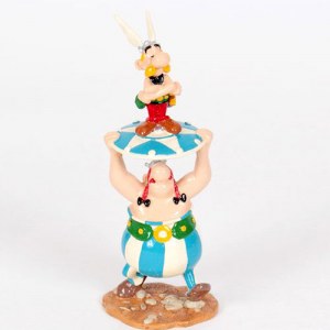 OBÉLIX POURTANT ASTÉRIX SUR UN BOUCLIER